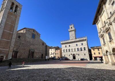 stone buildings with a tower in Piazza Grande, Montepulciano